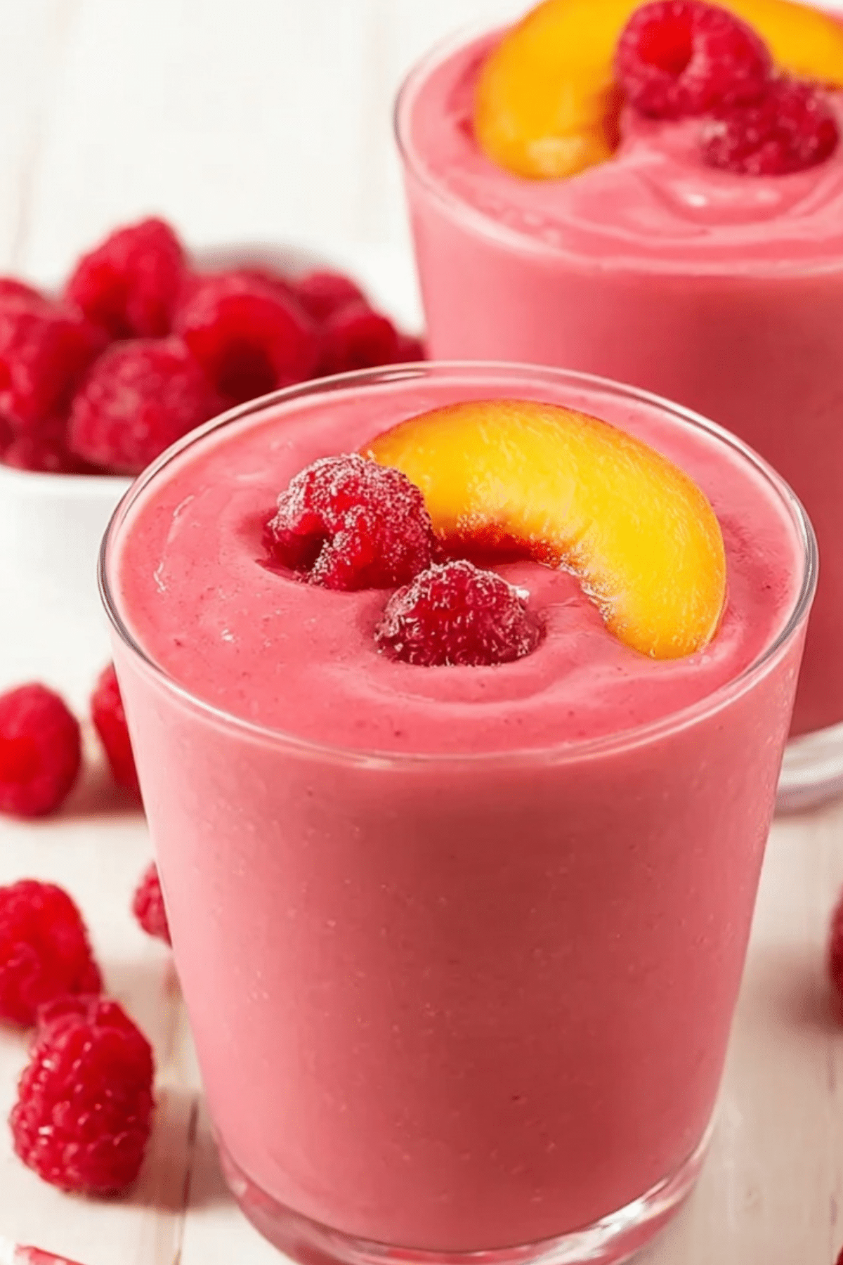 Raspberry Peach Smoothie with fresh fruit and yogurt