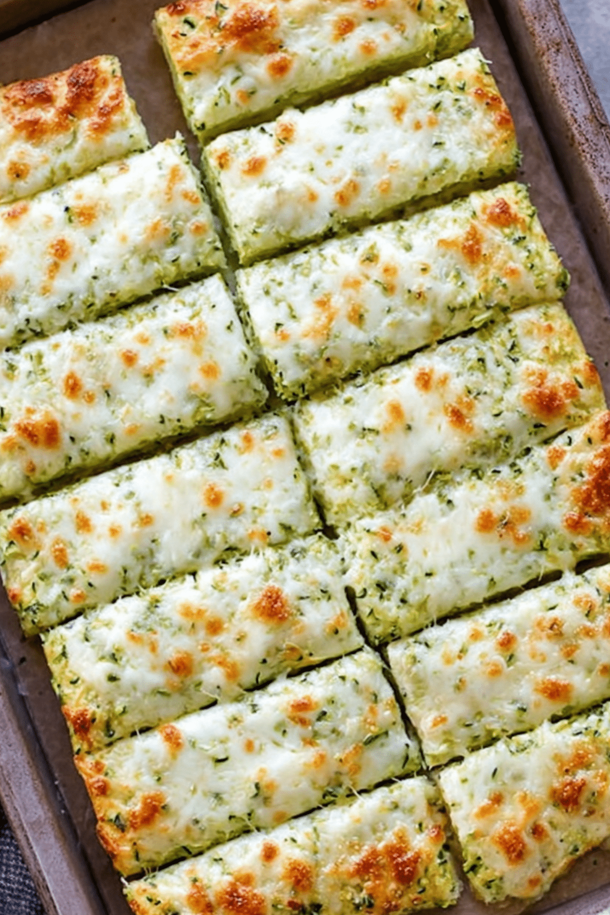 Cheesy Zucchini Breadsticks fresh from the oven, crispy and golden.