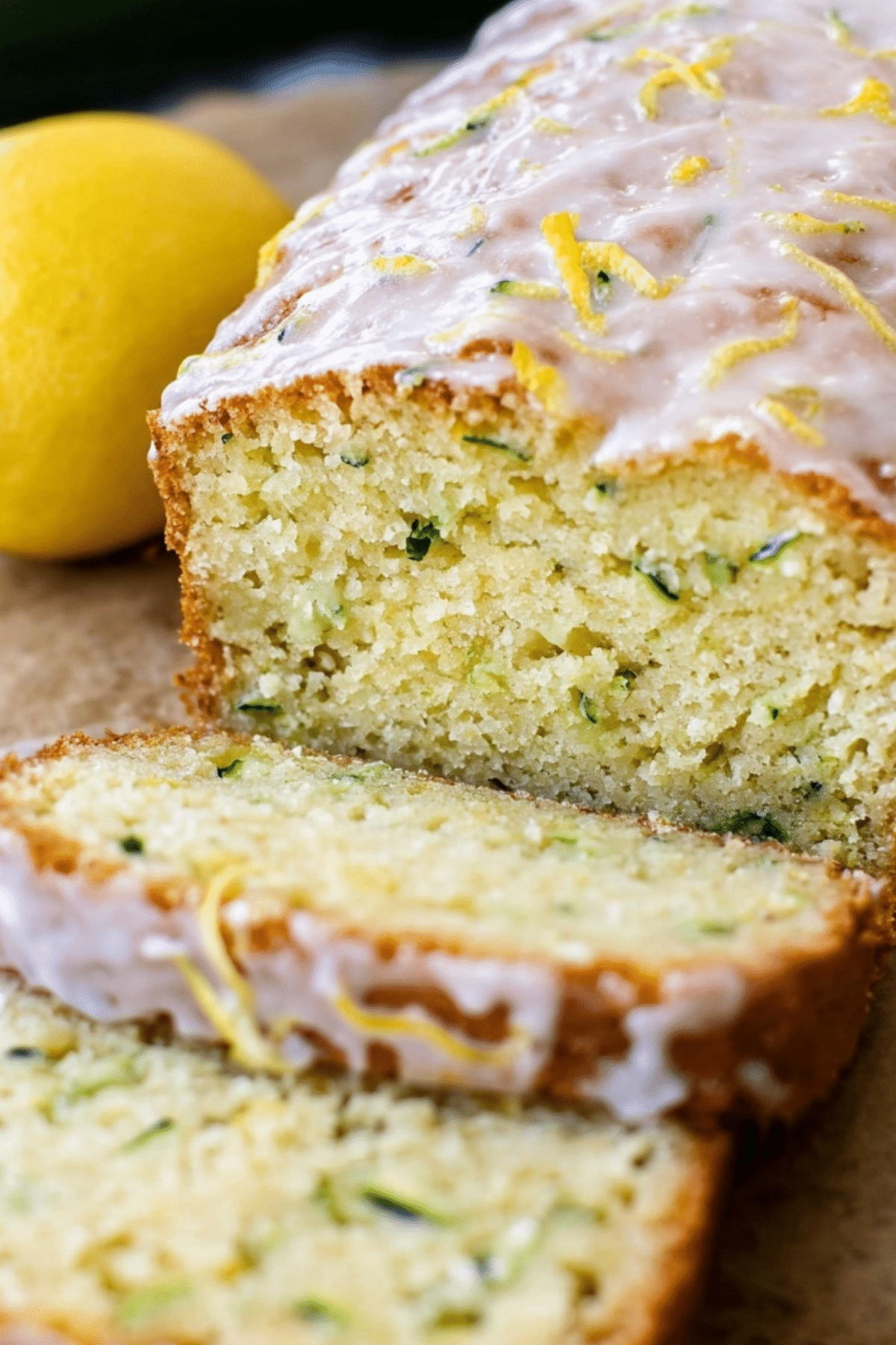 Moist and tangy lemon zucchini bread loaf with glaze