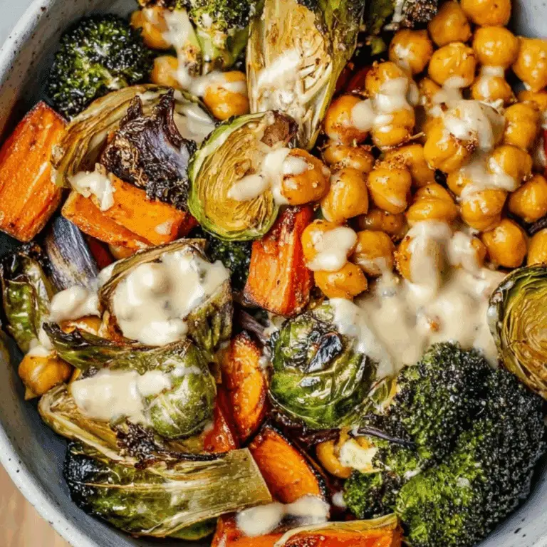 Roasted Veggie and Chickpea Bowl with tahini maple dressing