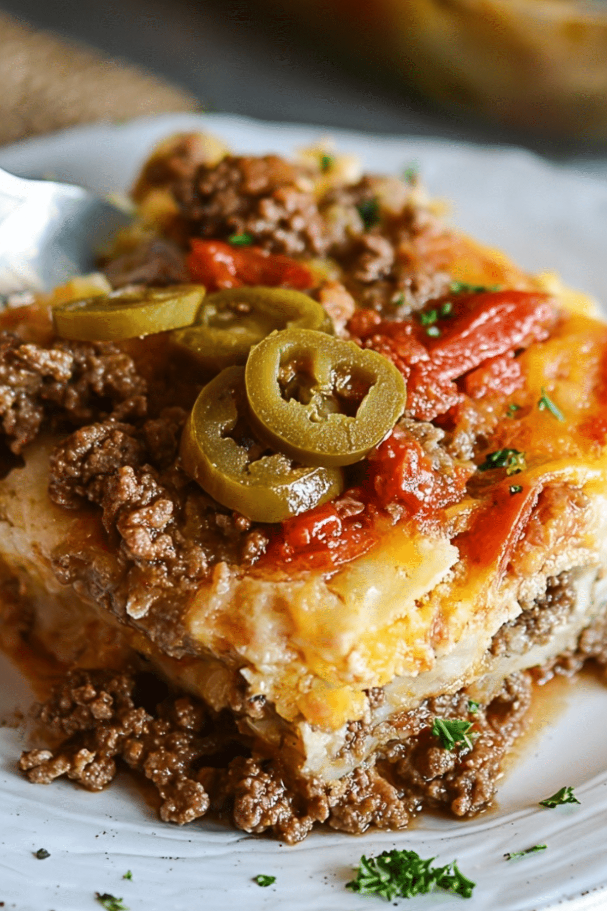 Southern Five Layer Beef Casserole in baking dish with visible layers
