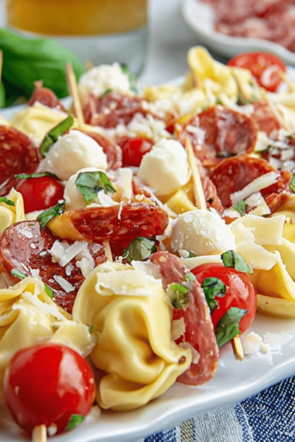 Tortellini Skewers Appetizer served on a platter with salami and mozzarella