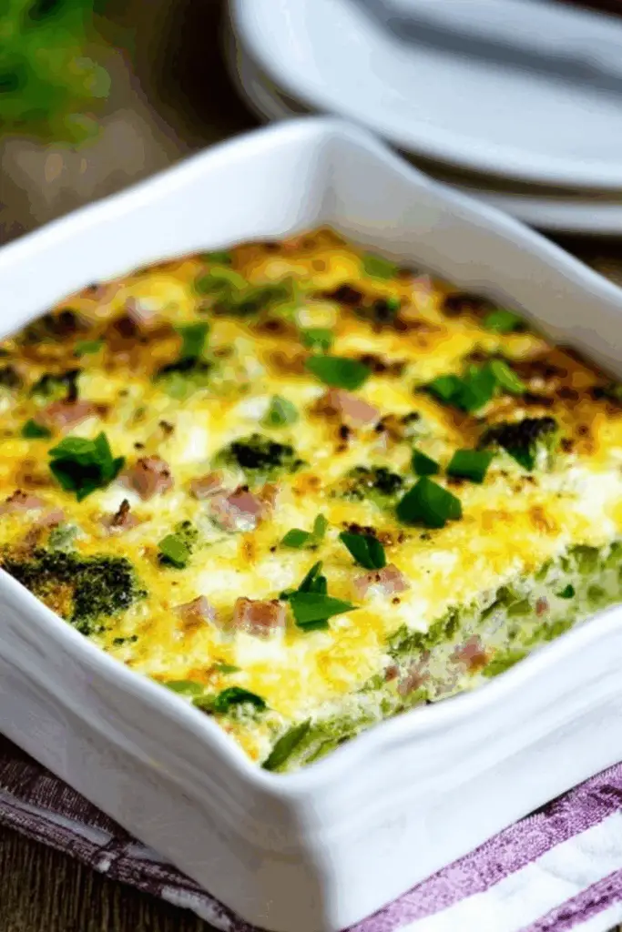 broccoli ham mozzarella egg bake in casserole dish