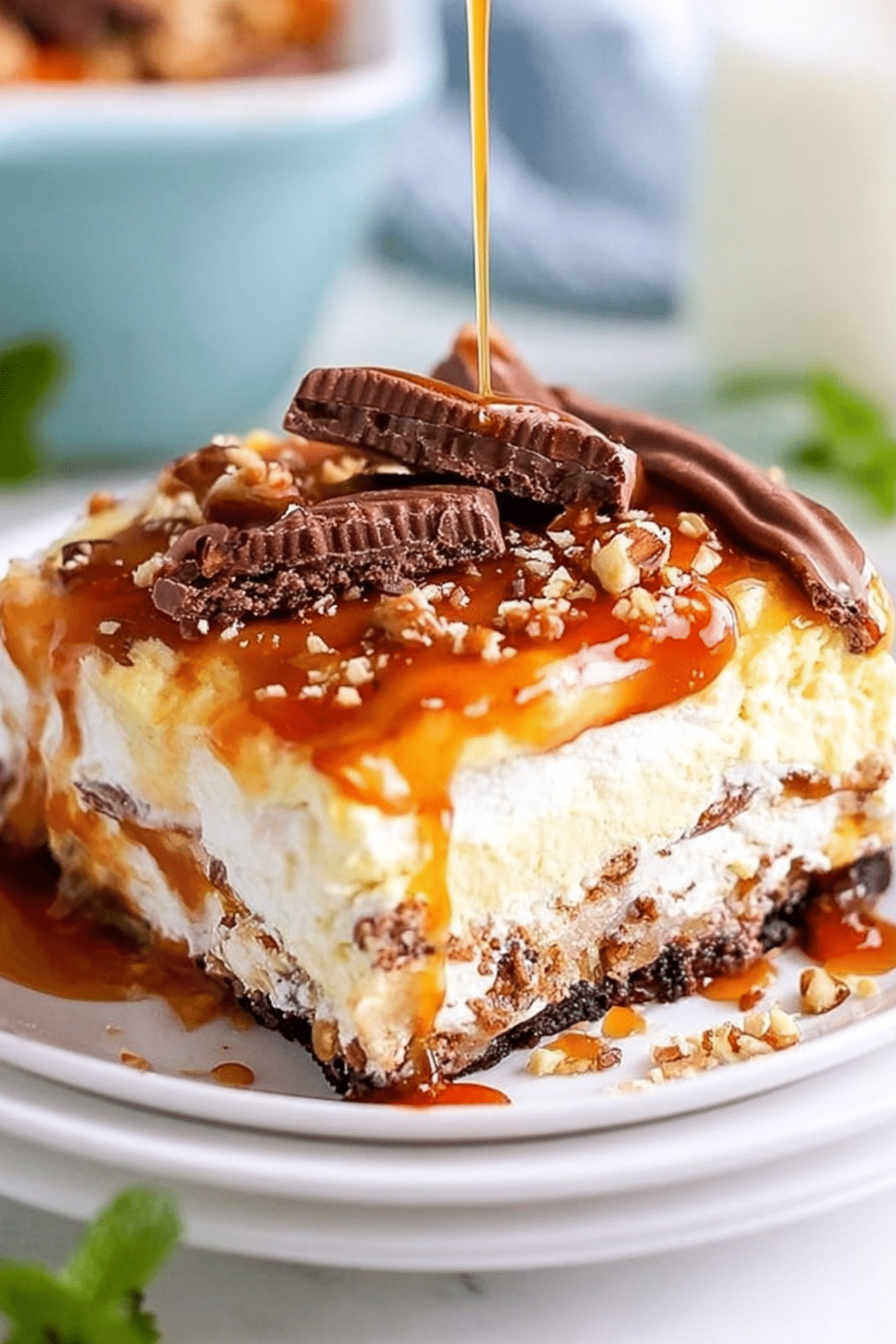 5 Layer Turtle Lasagna with creamy filling, caramel drizzle, and chocolate topping