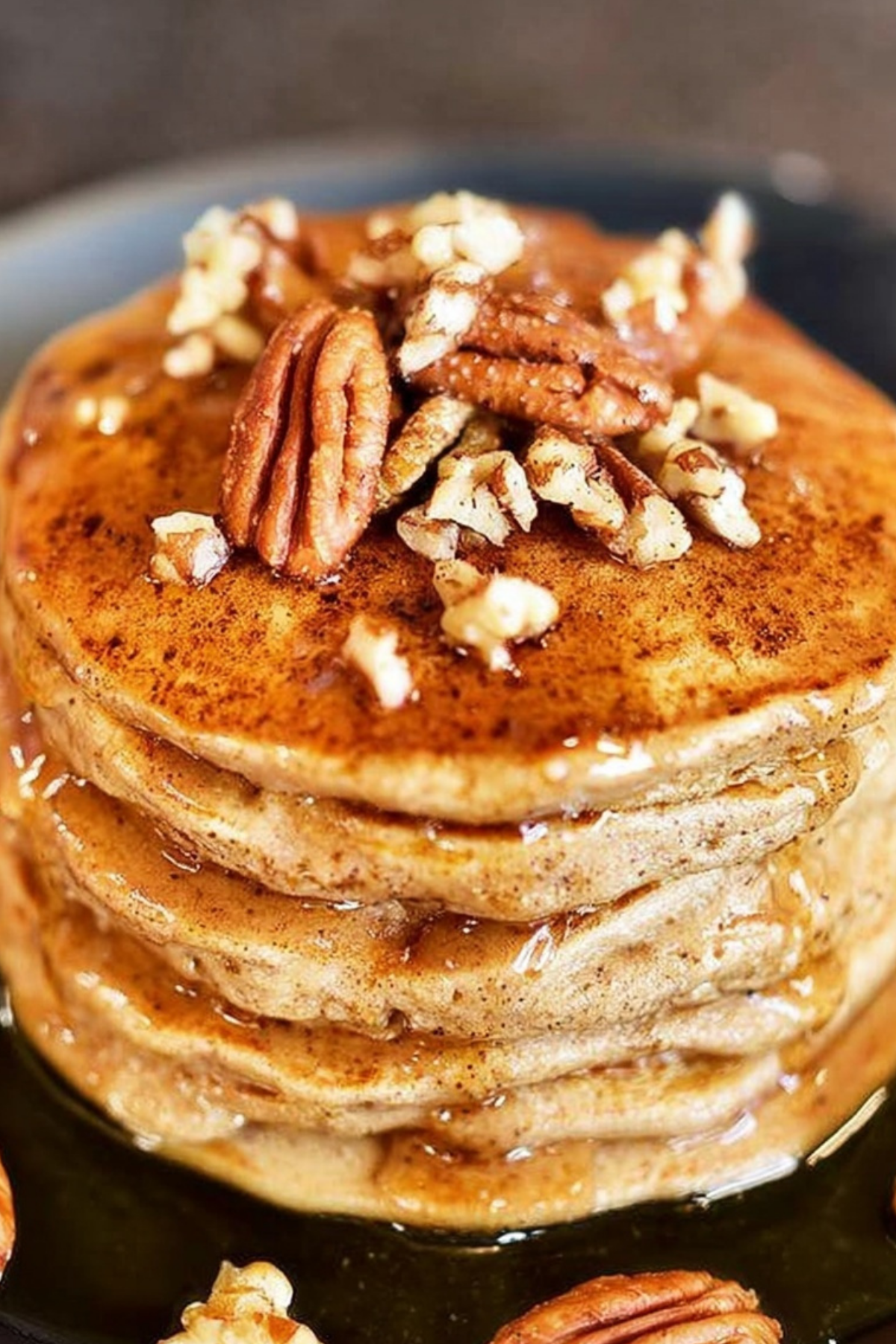Apple Butter Pancakes served with syrup and nuts