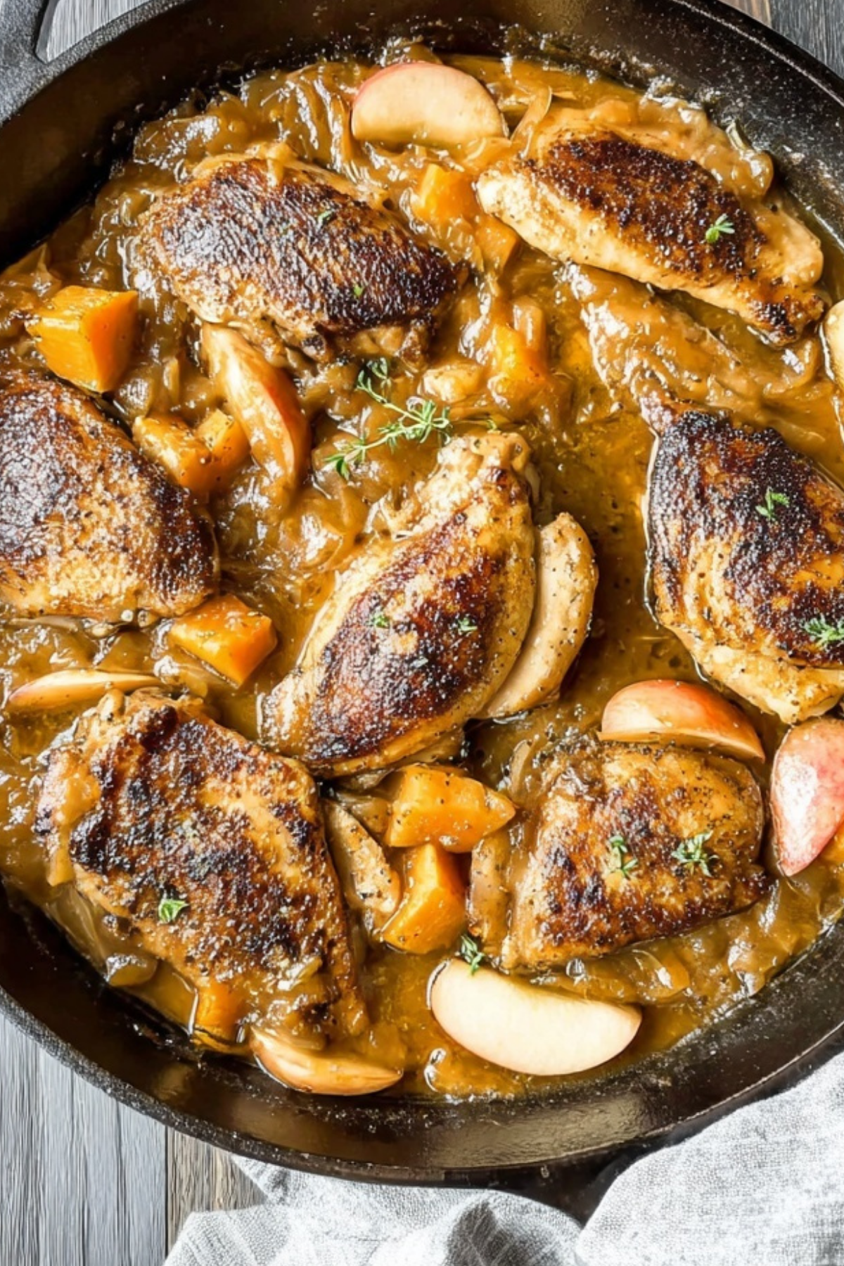 Apple Cider Chicken with Butternut Squash in a skillet