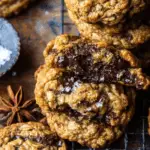 chewy pumpkin oatmeal chocolate chip cookies on a baking tray