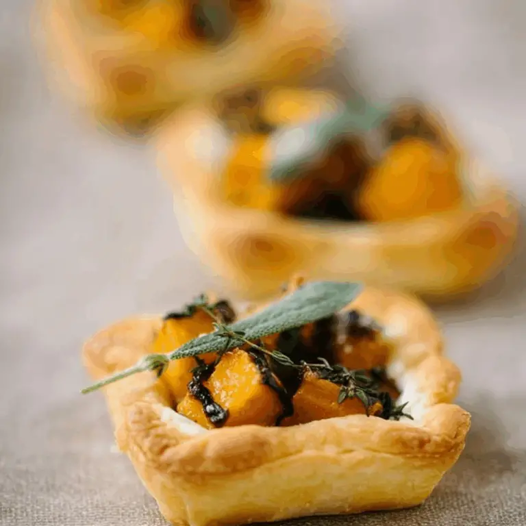 Mini Butternut Squash Tarts with caramelized onions and ricotta
