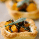 Mini Butternut Squash Tarts with caramelized onions and ricotta