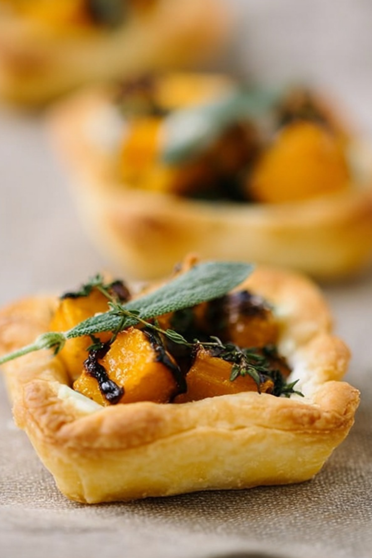 Mini Butternut Squash Tarts with caramelized onions and ricotta