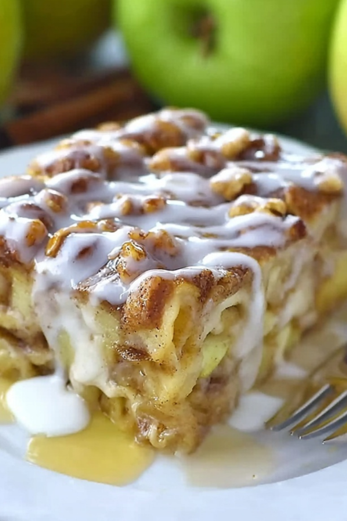 Caramel Apple Cinnamon Roll Lasagna served warm with caramel drizzle