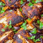 Sheet pan with chili and brown sugar spice rub chicken and sweet potatoes