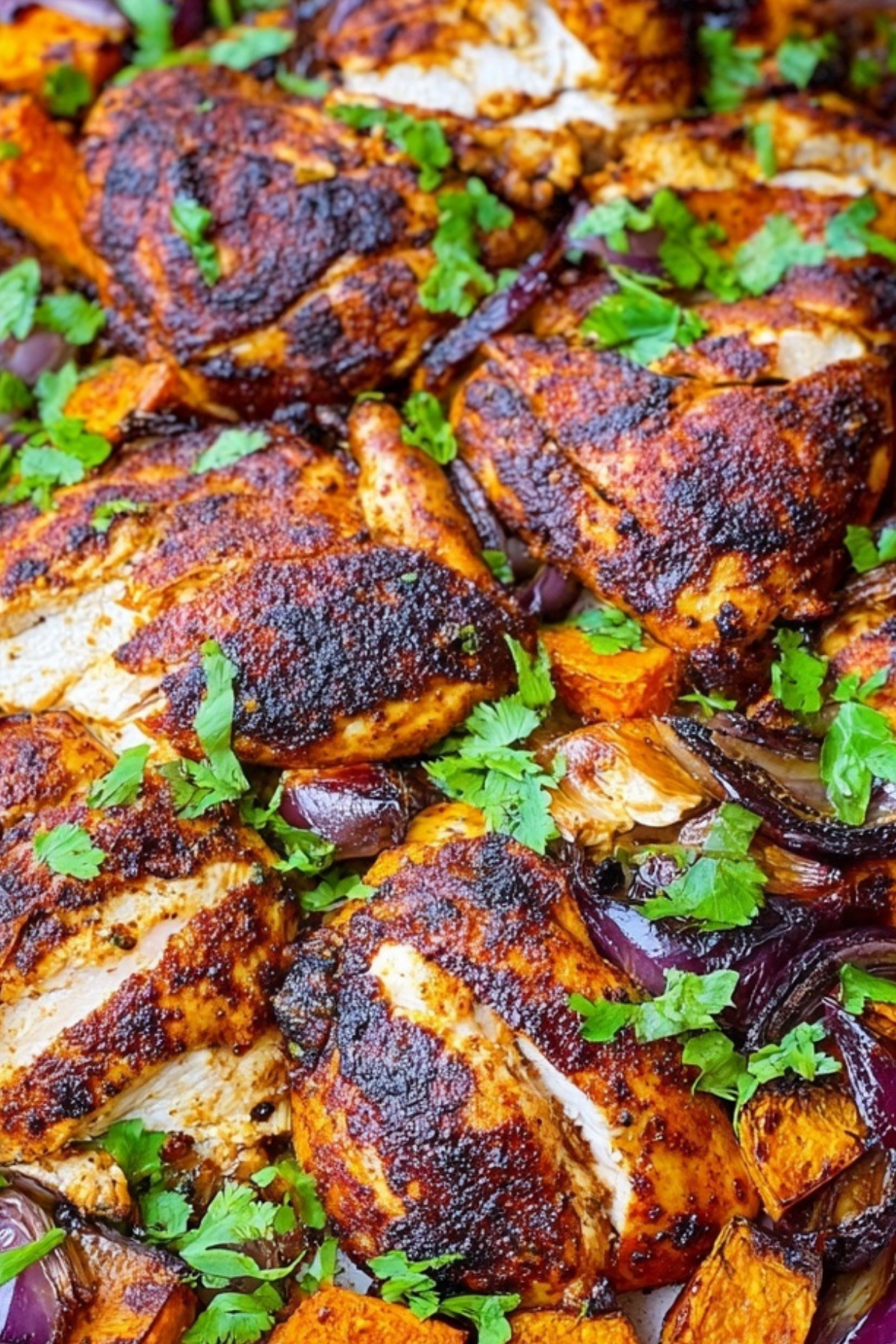 Sheet pan with chili and brown sugar spice rub chicken and sweet potatoes
