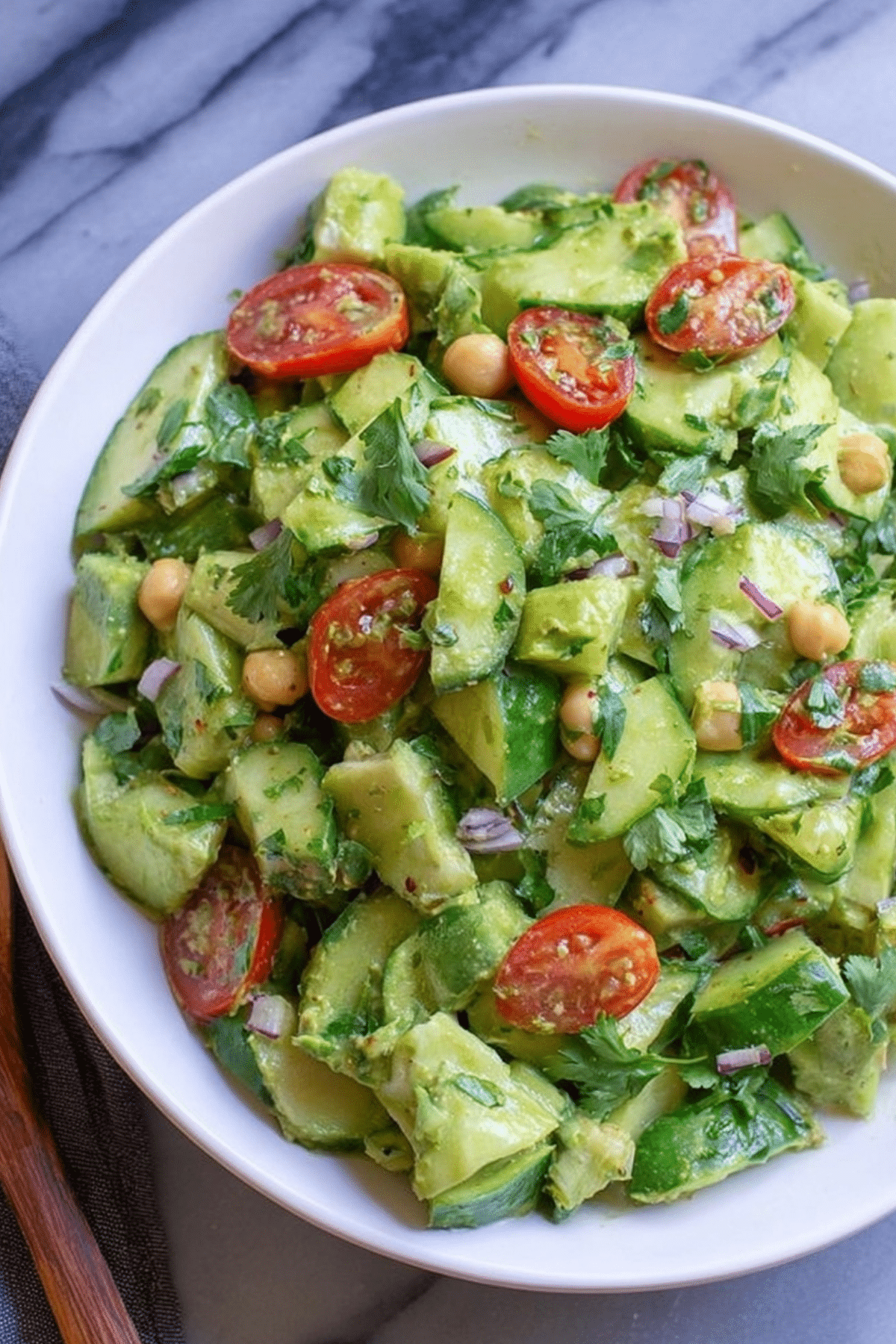 Cilantro Lime Cucumber Salad with creamy dressing and fresh vegetables