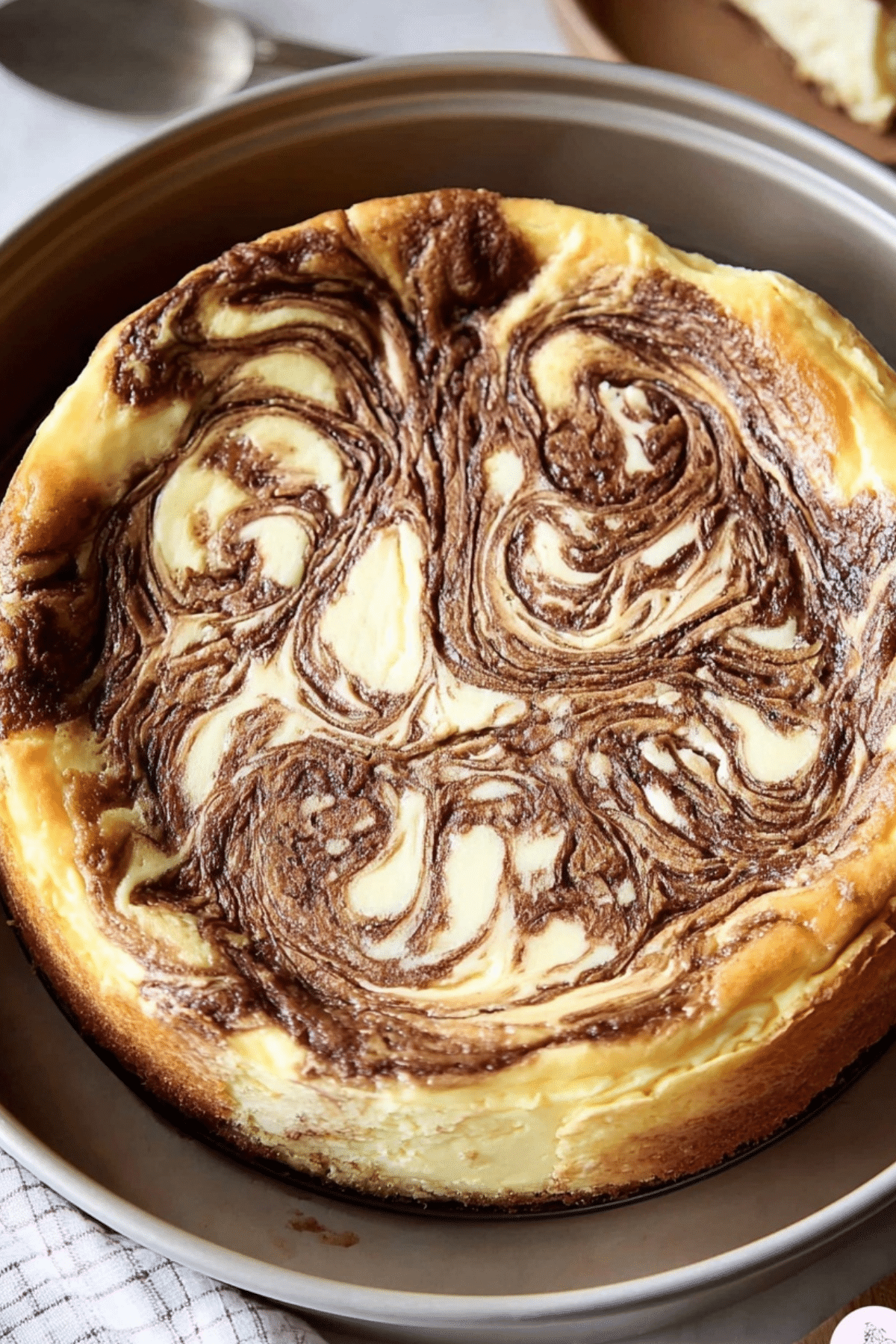 Cinnamon Roll Cheesecake with creamy filling and cinnamon topping