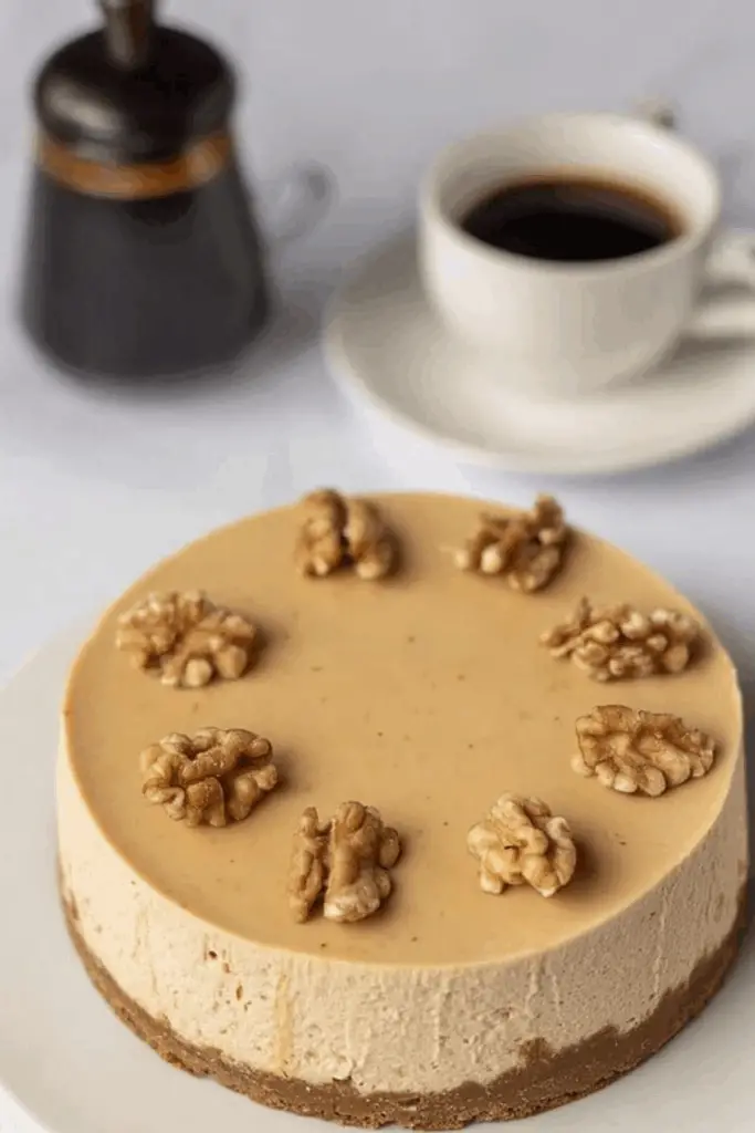 coffee cheesecake dessert with creamy filling and walnut topping