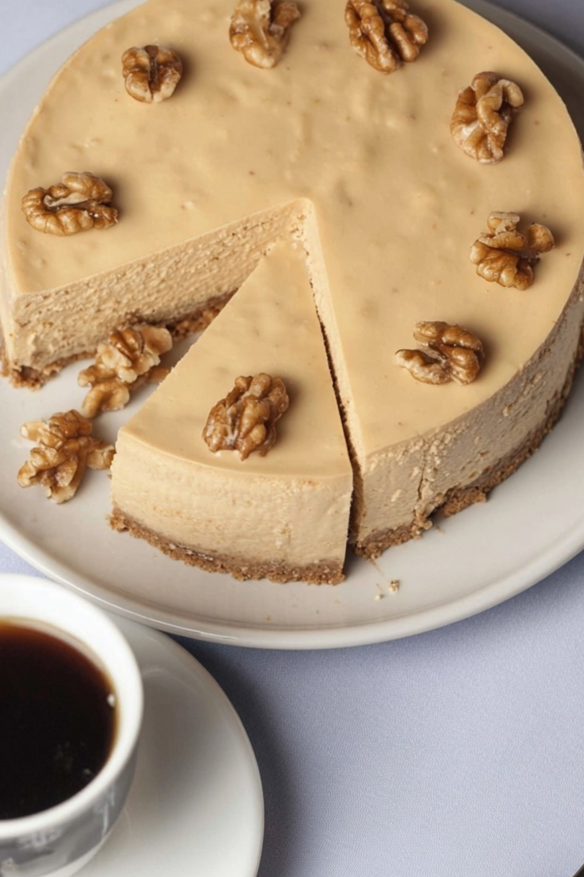coffee cheesecake dessert with creamy filling and walnut topping