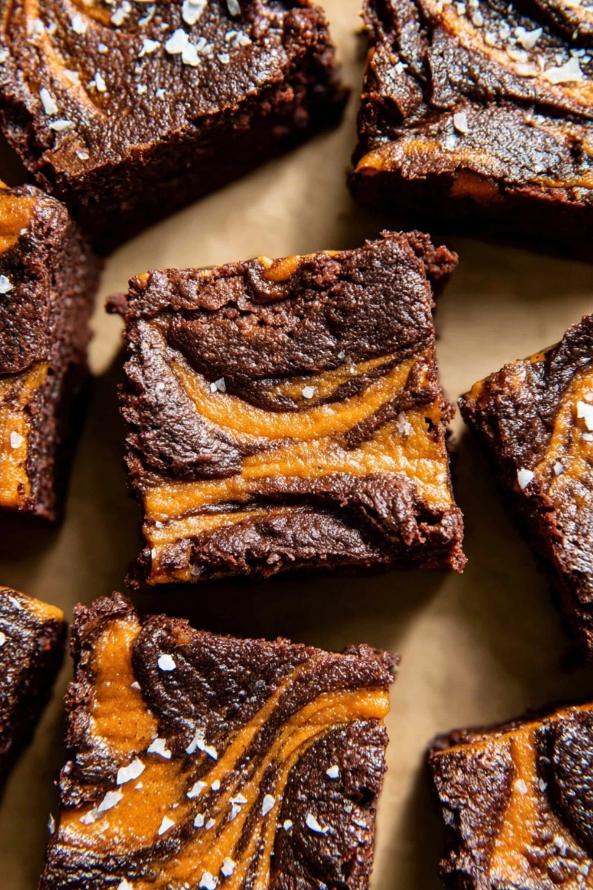 Pumpkin Brownies served on a plate with chocolate chips