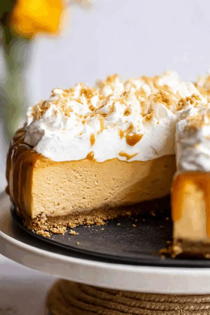 Pumpkin Caramel Cheesecake topped with homemade caramel sauce