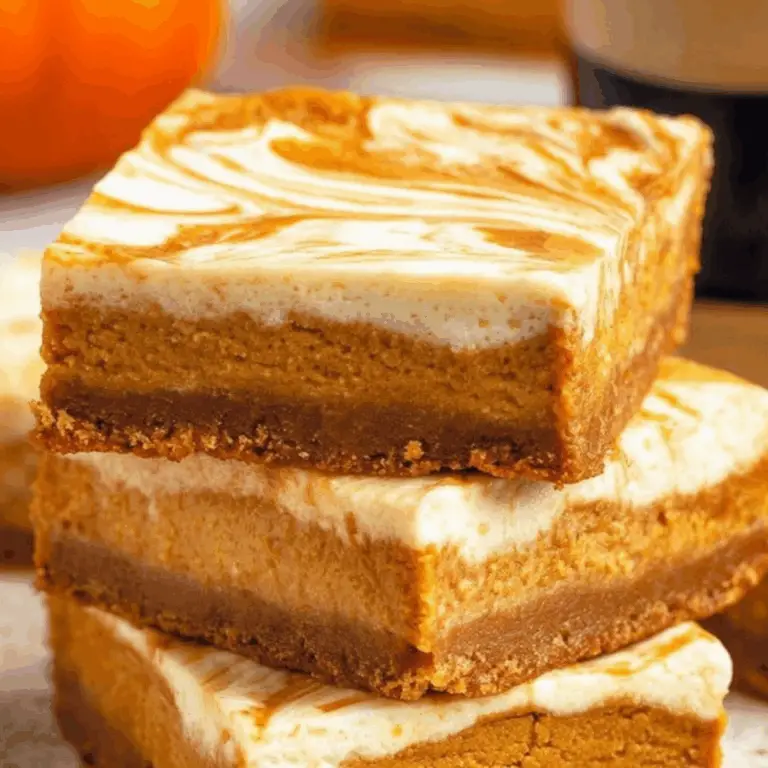 Pumpkin Cheesecake Bars recipe with pumpkin pie and cheesecake swirl