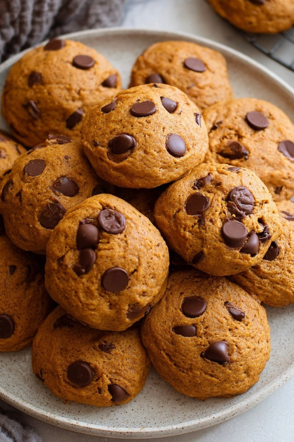 Pumpkin Chocolate Chip Cookies on baking tray – soft and spiced fall cookies