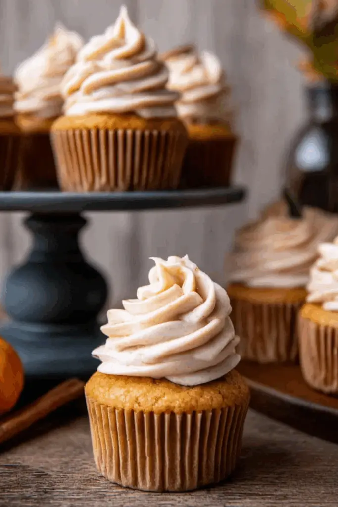 Moist pumpkin cupcakes with cream cheese frosting