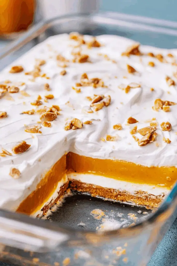 Pumpkin Delight layered dessert with pecans and whipped topping