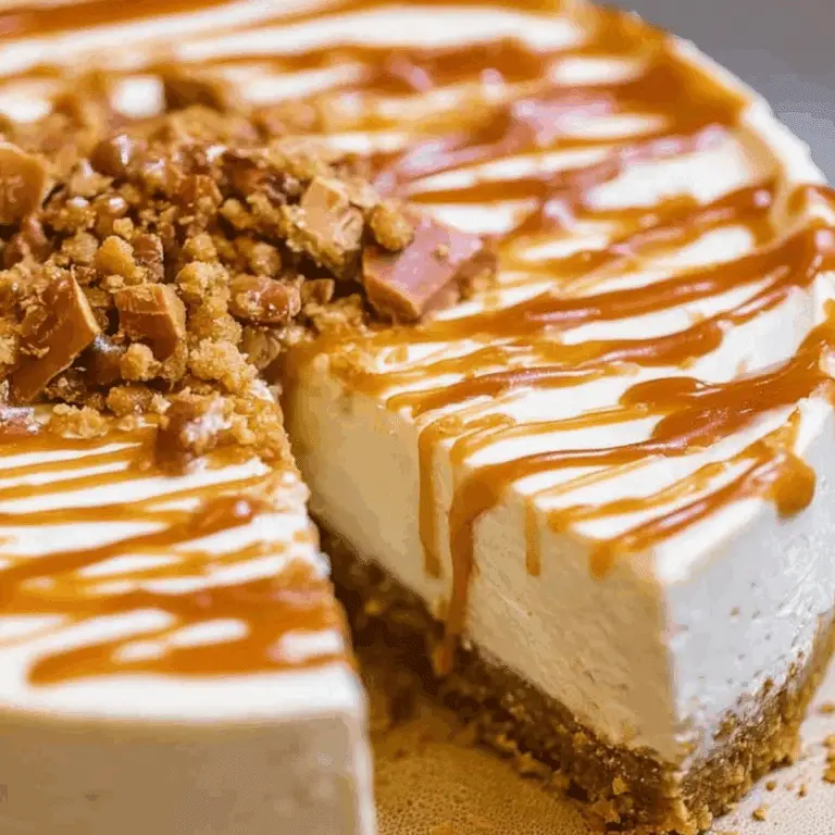 Salted Caramel Cheesecake with whipped cream and caramel drizzle