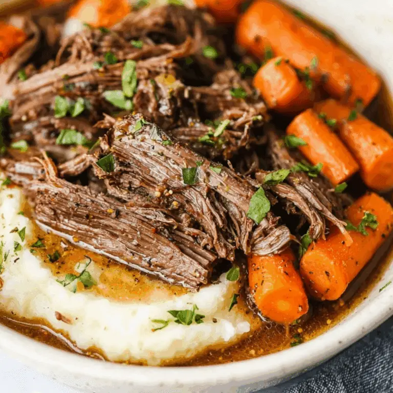 Slow Cooker Garlic Herb Pot Roast with savory gravy and vegetables