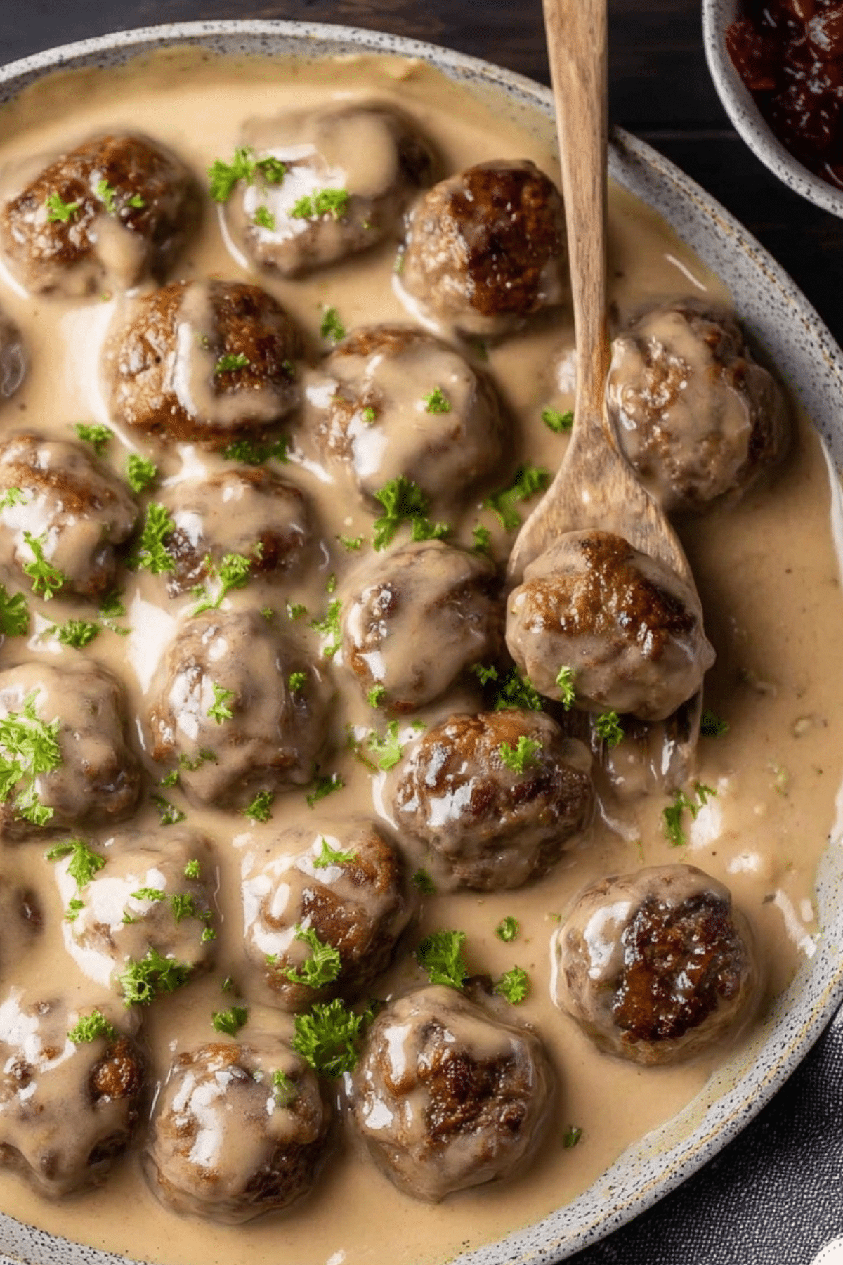 Swedish meatballs served over egg noodles with creamy gravy