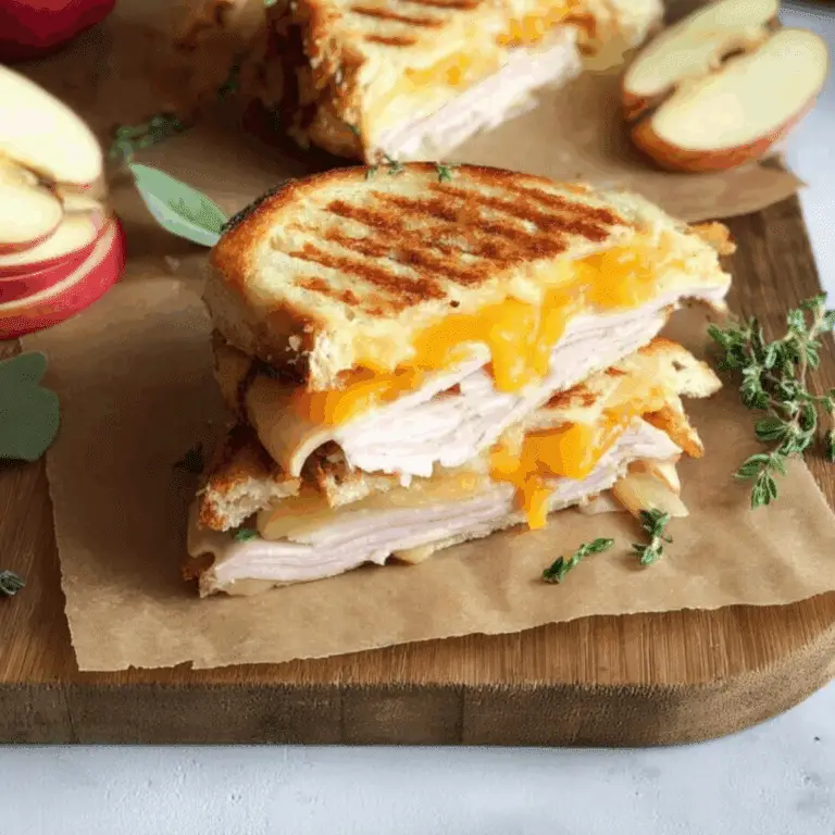 Turkey Apple and Cheddar Panini sandwich on a plate