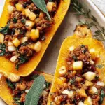Sausage Stuffed Butternut Squash with cranberries and pecans