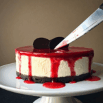 Bloody Good Halloween Cheesecake with chocolate cookie base and red drip effect