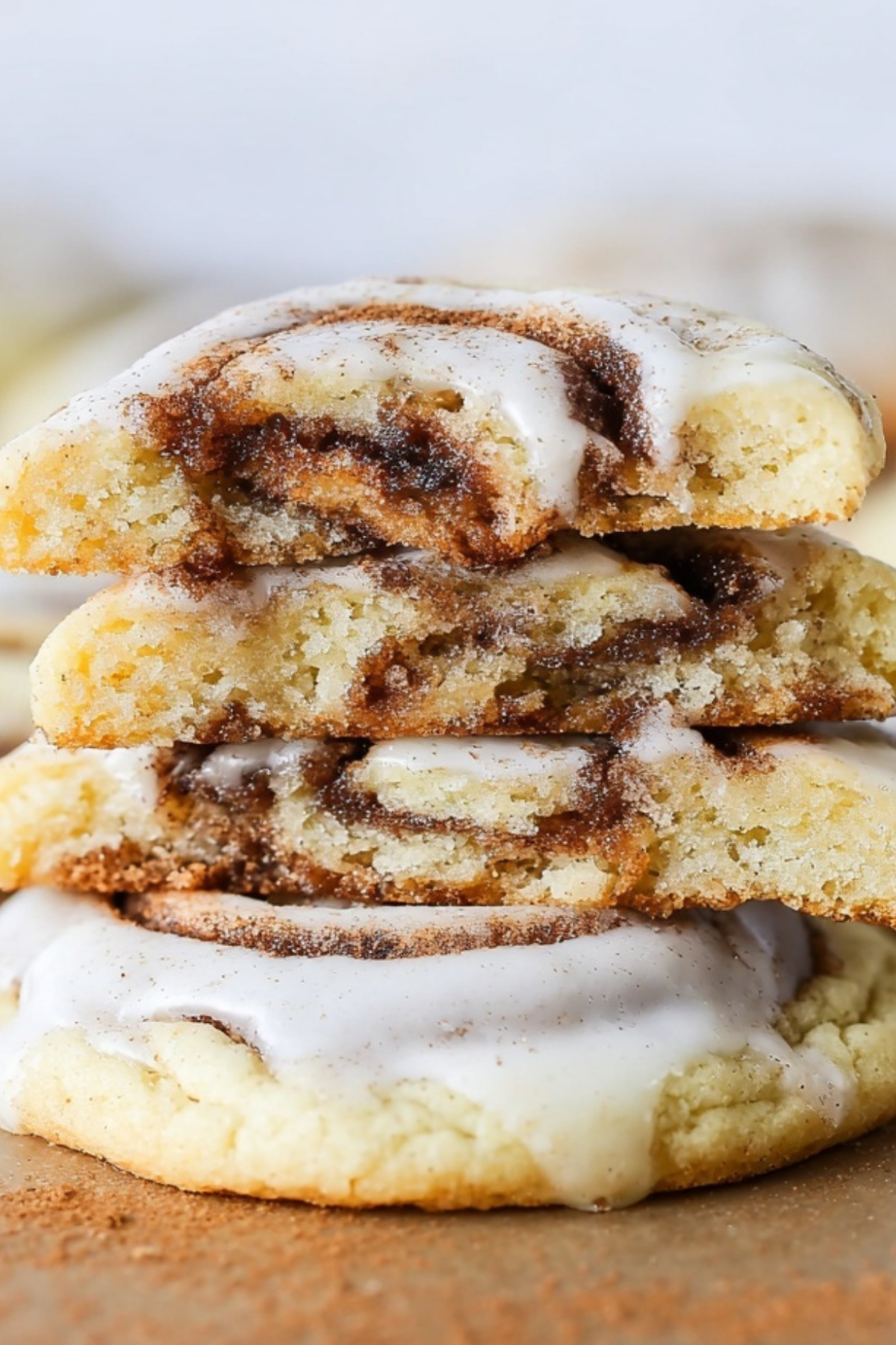 freshly baked cinnamon roll cookies with cream cheese frosting