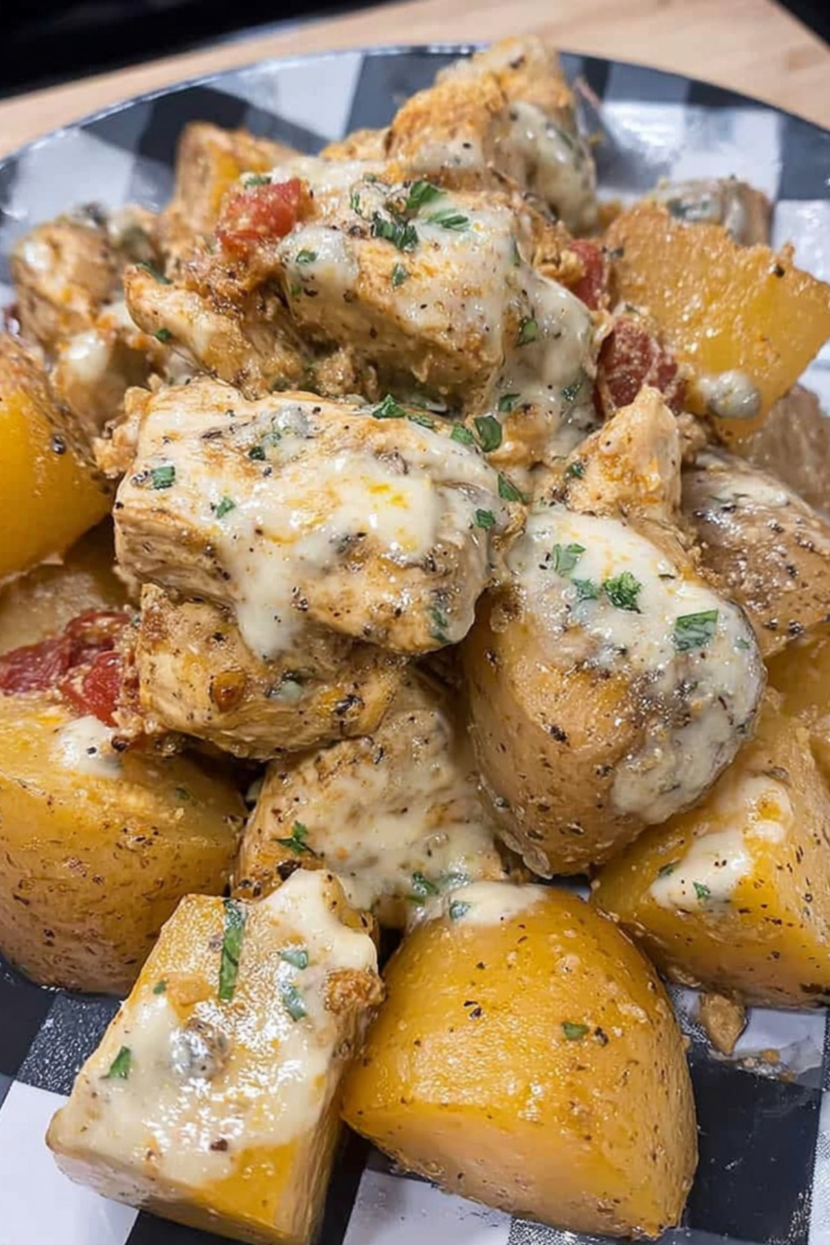 Garlic Parmesan Crockpot Chicken and Potatoes in slow cooker
