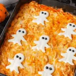 Halloween Buffalo Chicken Dip with spooky cheese ghosts