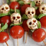 Halloween Caprese Salad Skewers with mozzarella skulls