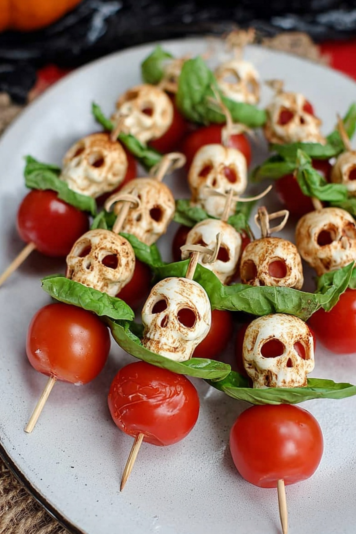 Halloween Caprese Salad Skewers with mozzarella skulls
