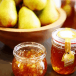 homemade spiced honey pear jam jar with spices
