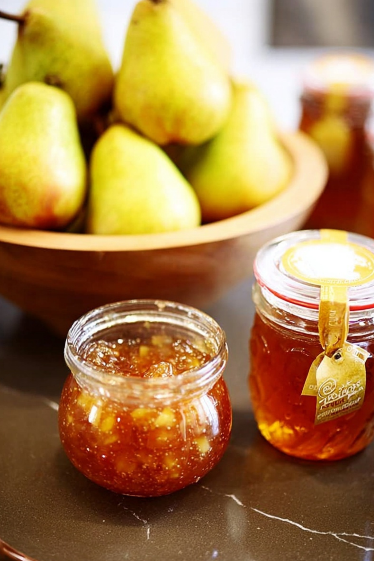 homemade spiced honey pear jam jar with spices