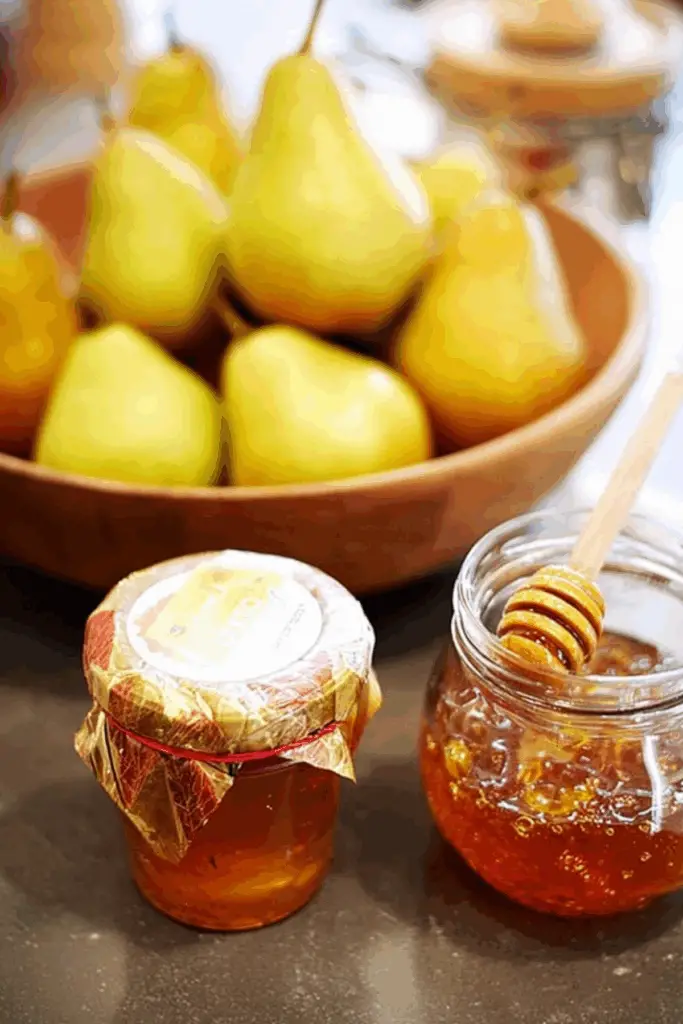 homemade spiced honey pear jam jar with spices