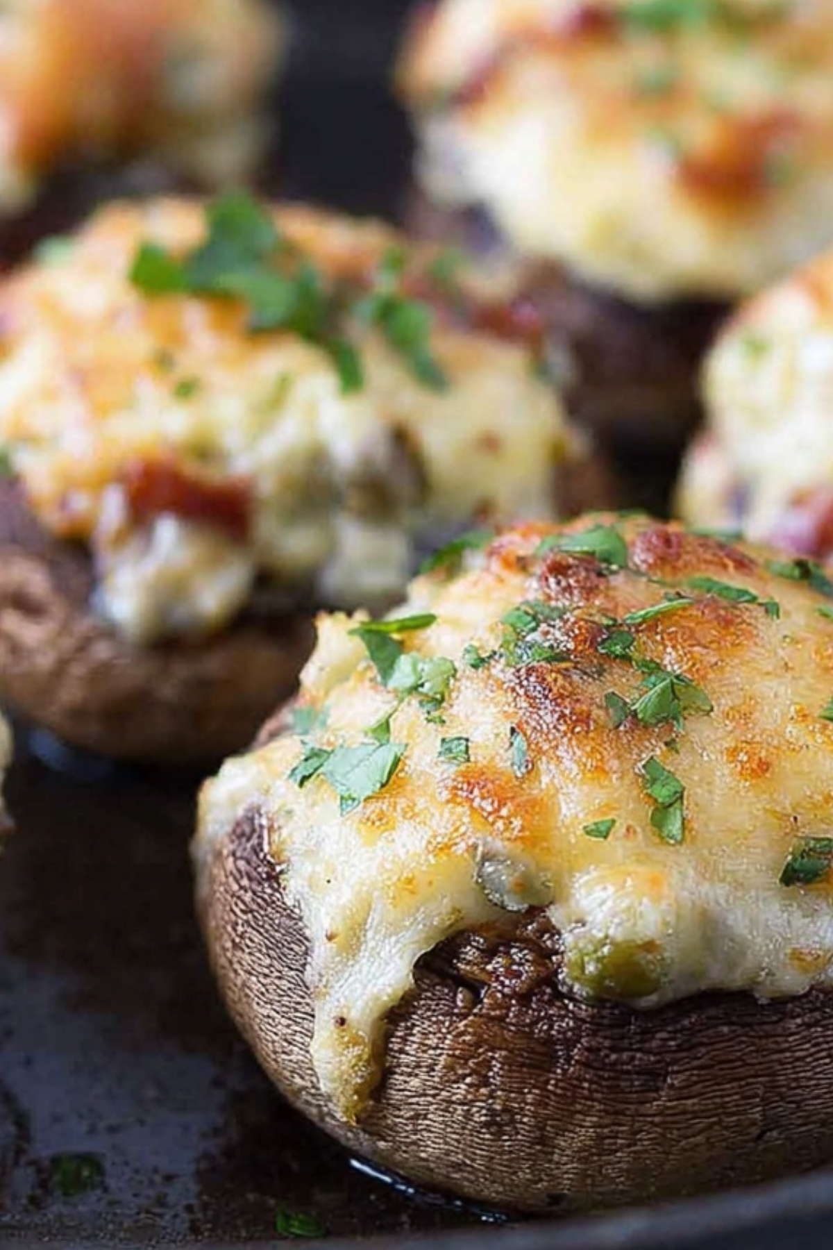 Jalapeno Popper Stuffed Mushrooms served hot in cast iron