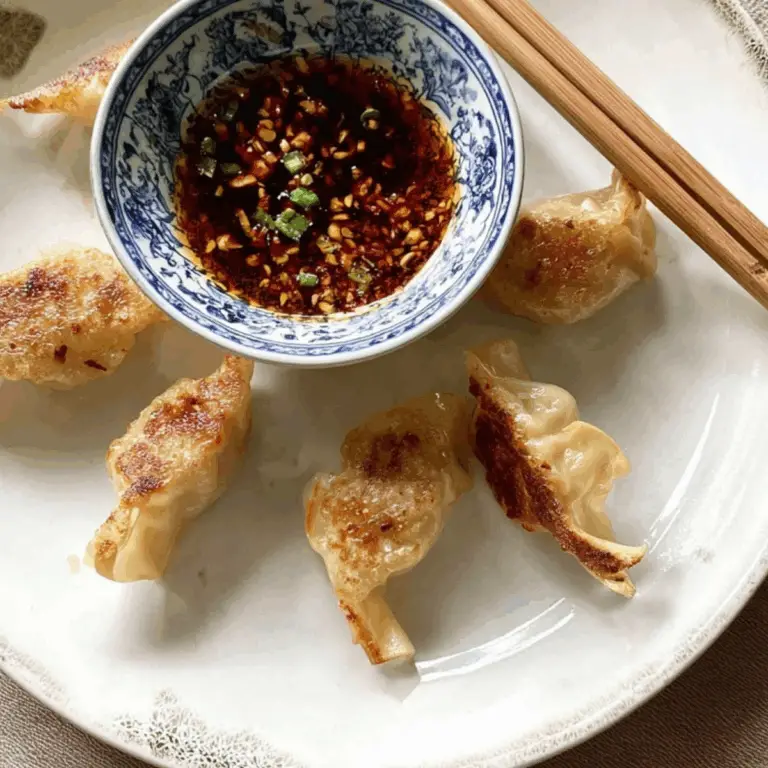 Japanese Gyoza Dipping Sauce in a bowl with dumplings