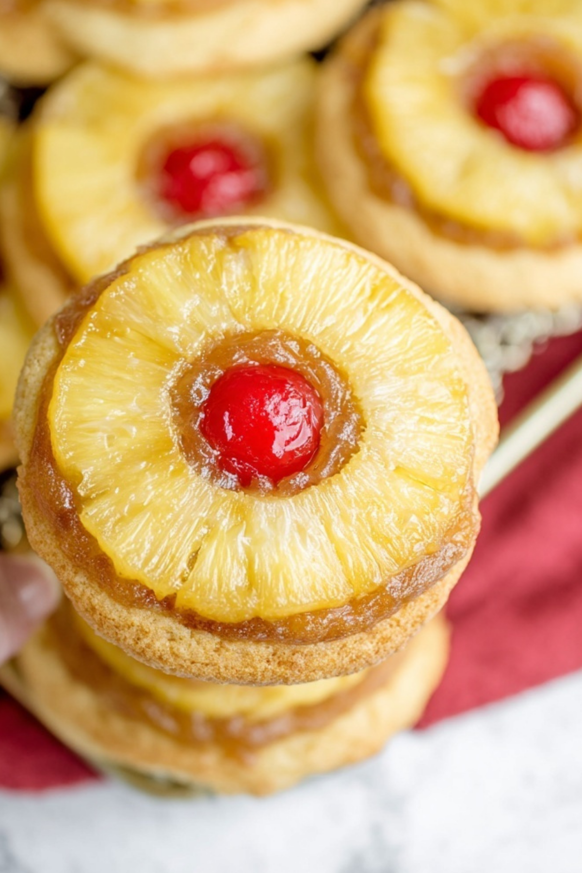 Pineapple Upside Down Sugar Cookies with maraschino cherry
