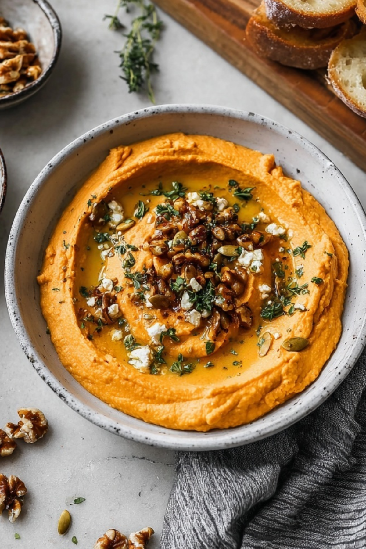 Pumpkin Whipped Feta Dip served with walnuts and thyme