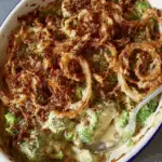 Vegan Broccoli Casserole topped with crispy onions and baked to perfection