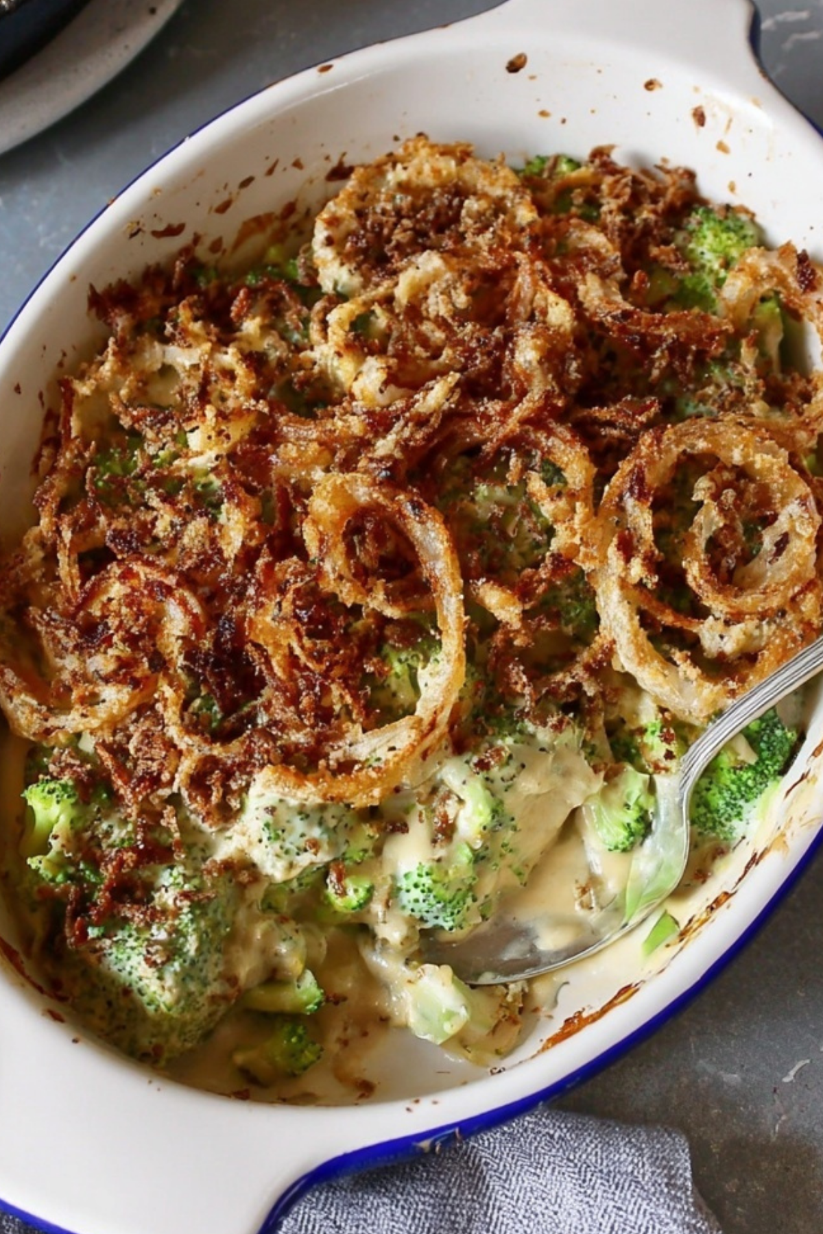 Vegan Broccoli Casserole topped with crispy onions and baked to perfection
