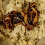 Vegan Caramelized Onion Mashed Potatoes with vegan butter and fresh thyme