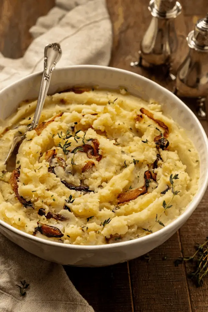 Vegan Caramelized Onion Mashed Potatoes with vegan butter and fresh thyme