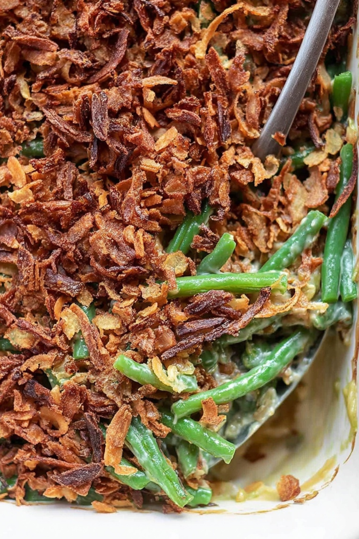 Vegan Green Bean Casserole with crispy topping and creamy mushroom sauce